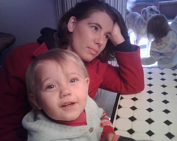 Close-up of woman and toddler indoors