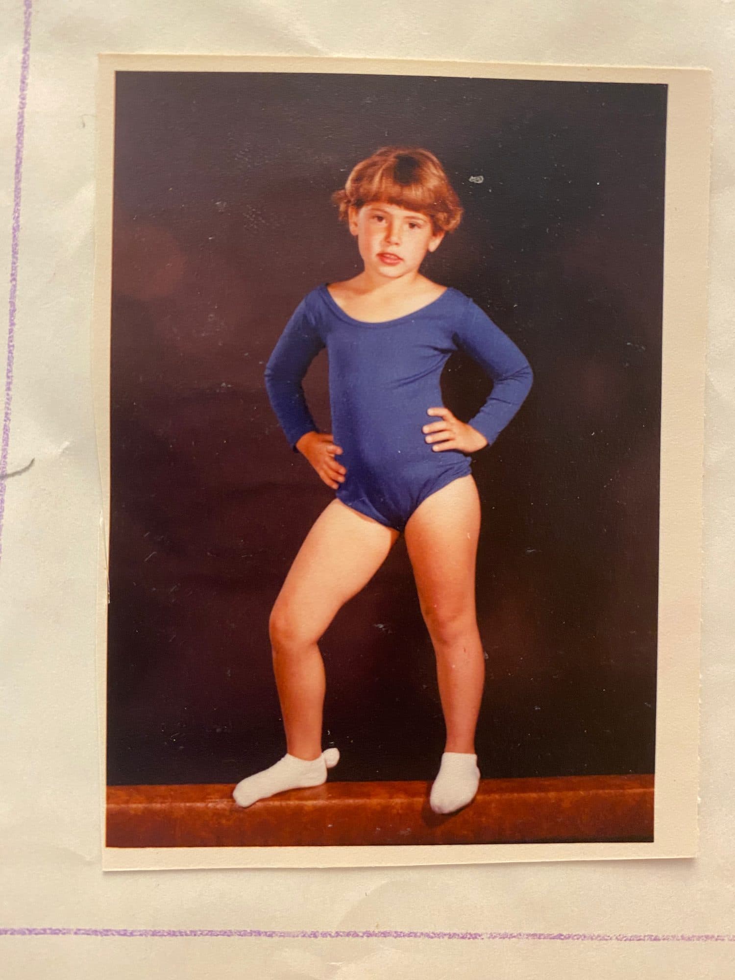 Girl posing in a leotard