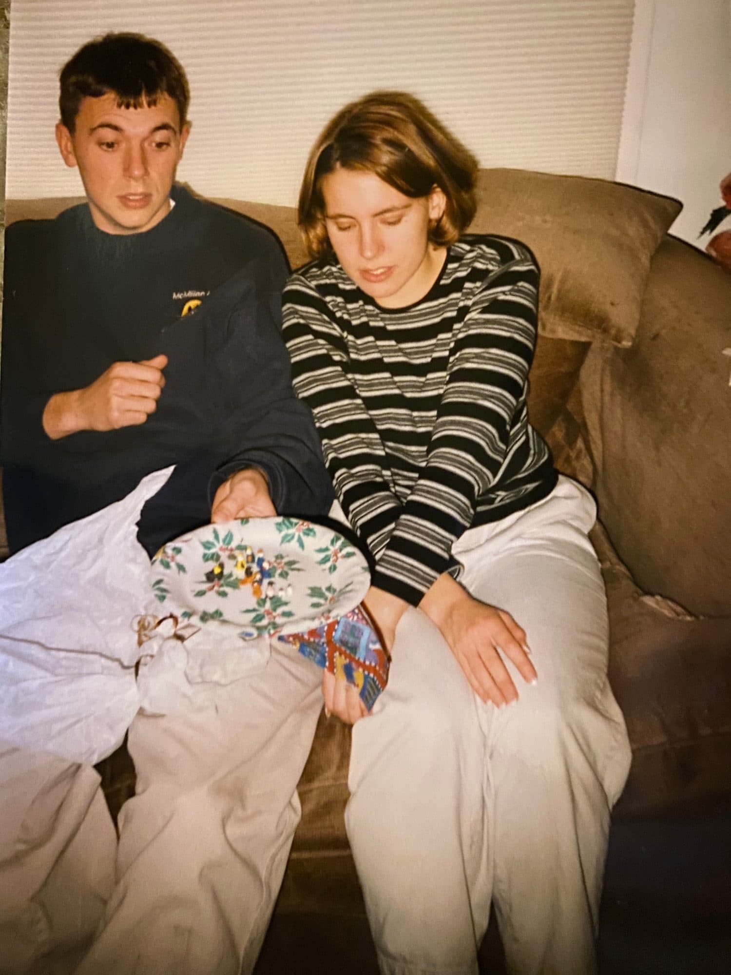 Couple sitting together on a couch