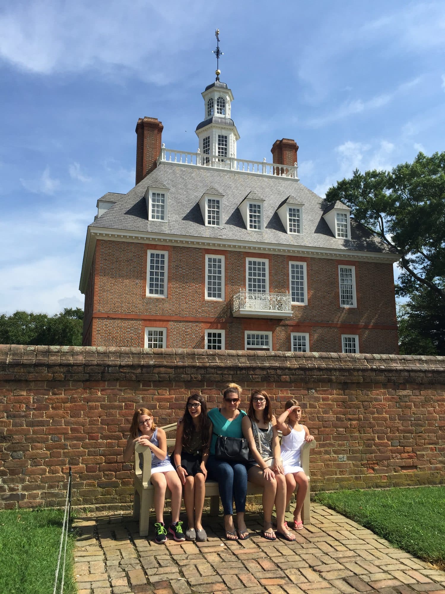 Women and girls at historic building