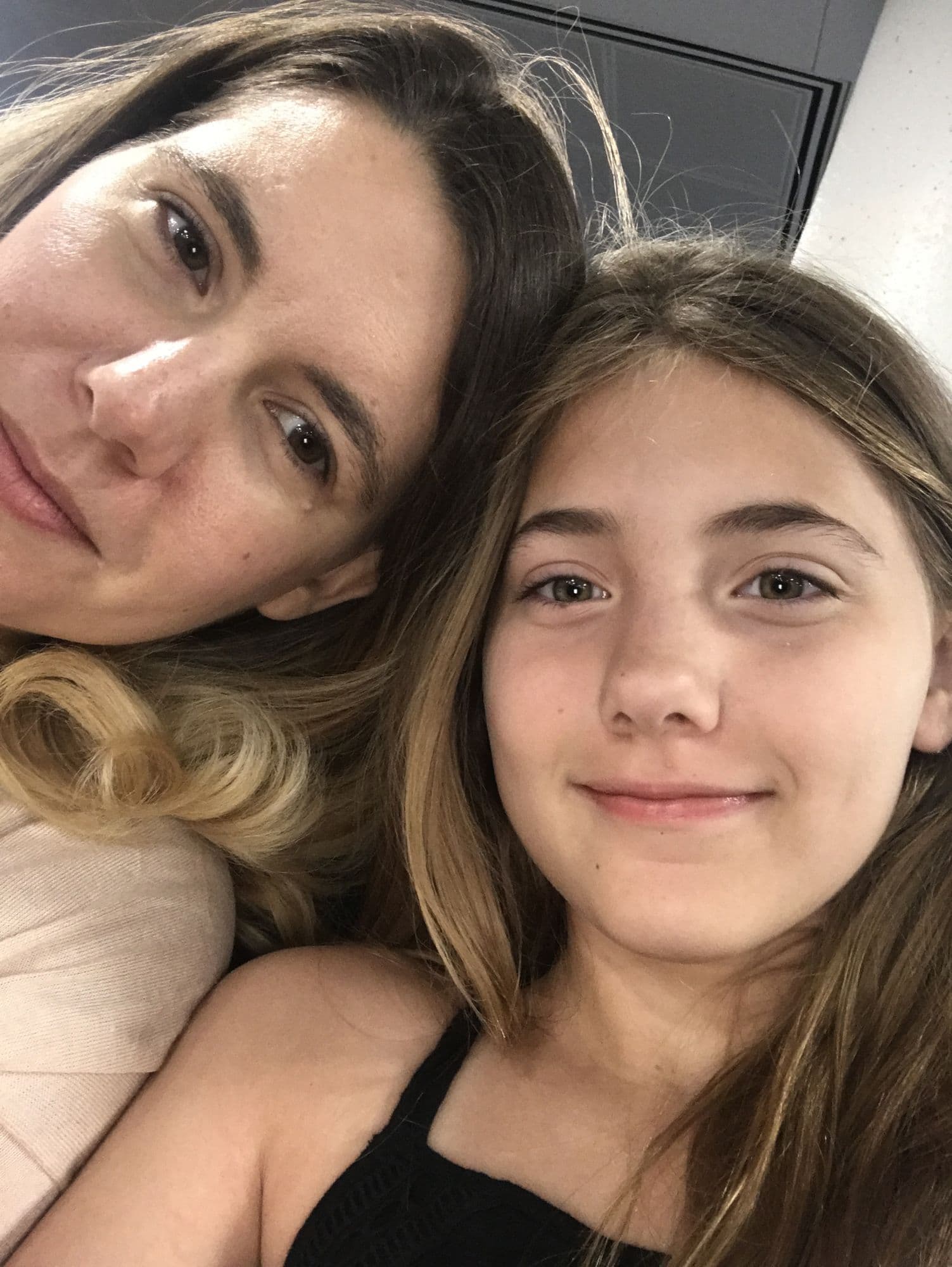 Close selfie of a mother and daughter