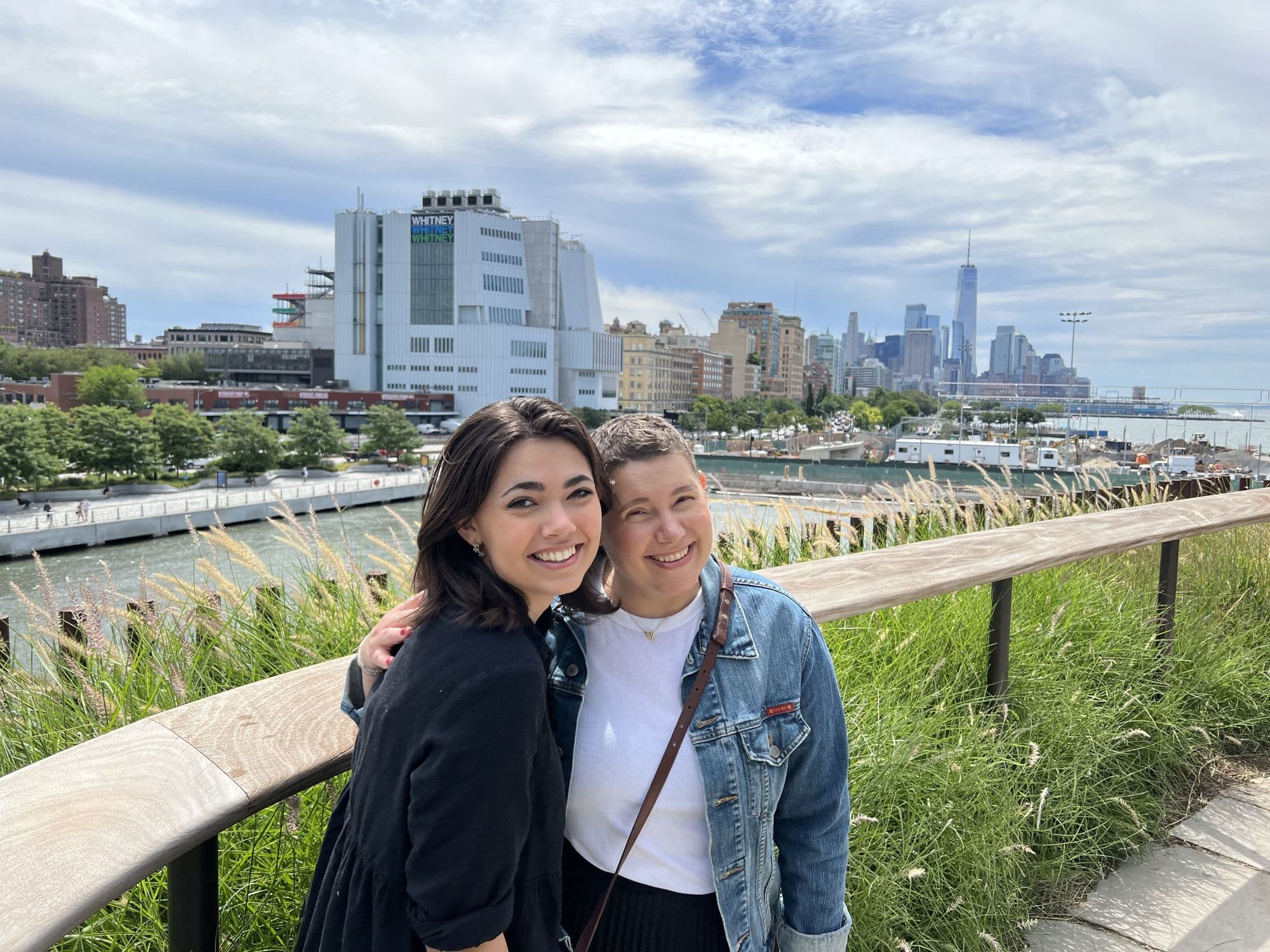Two women by a city waterfront