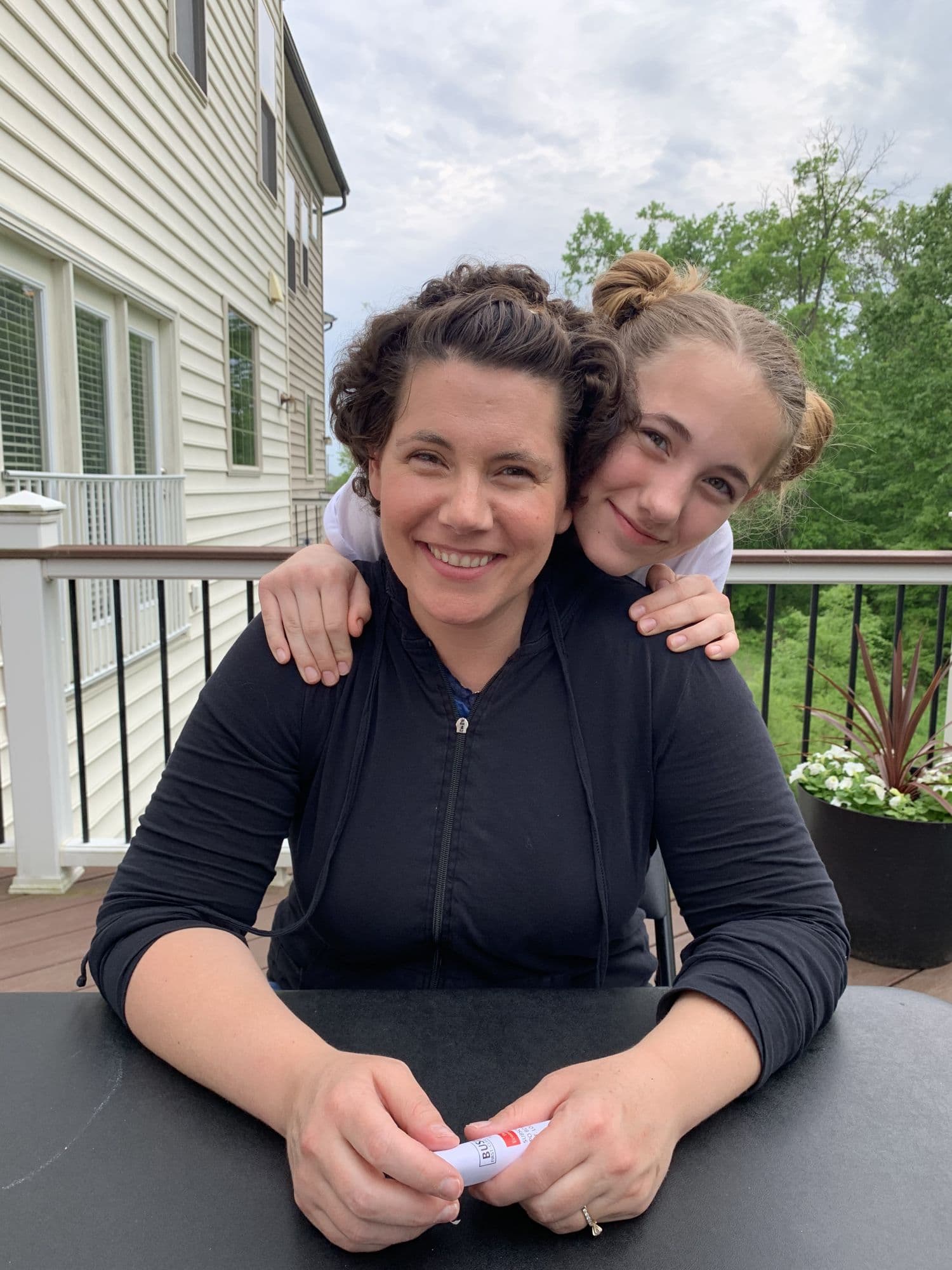 Woman and girl on a porch
