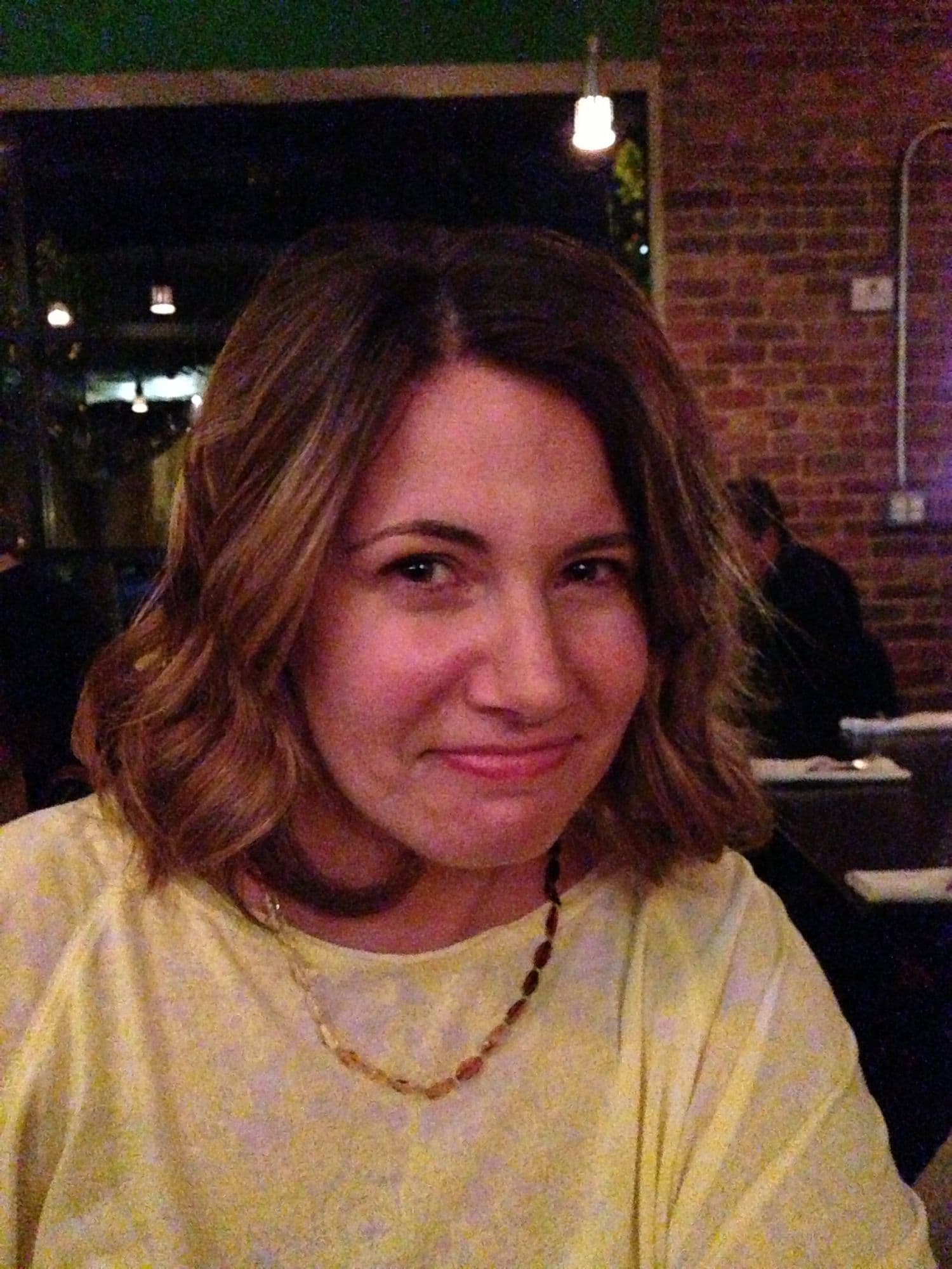 Woman smiling in restaurant