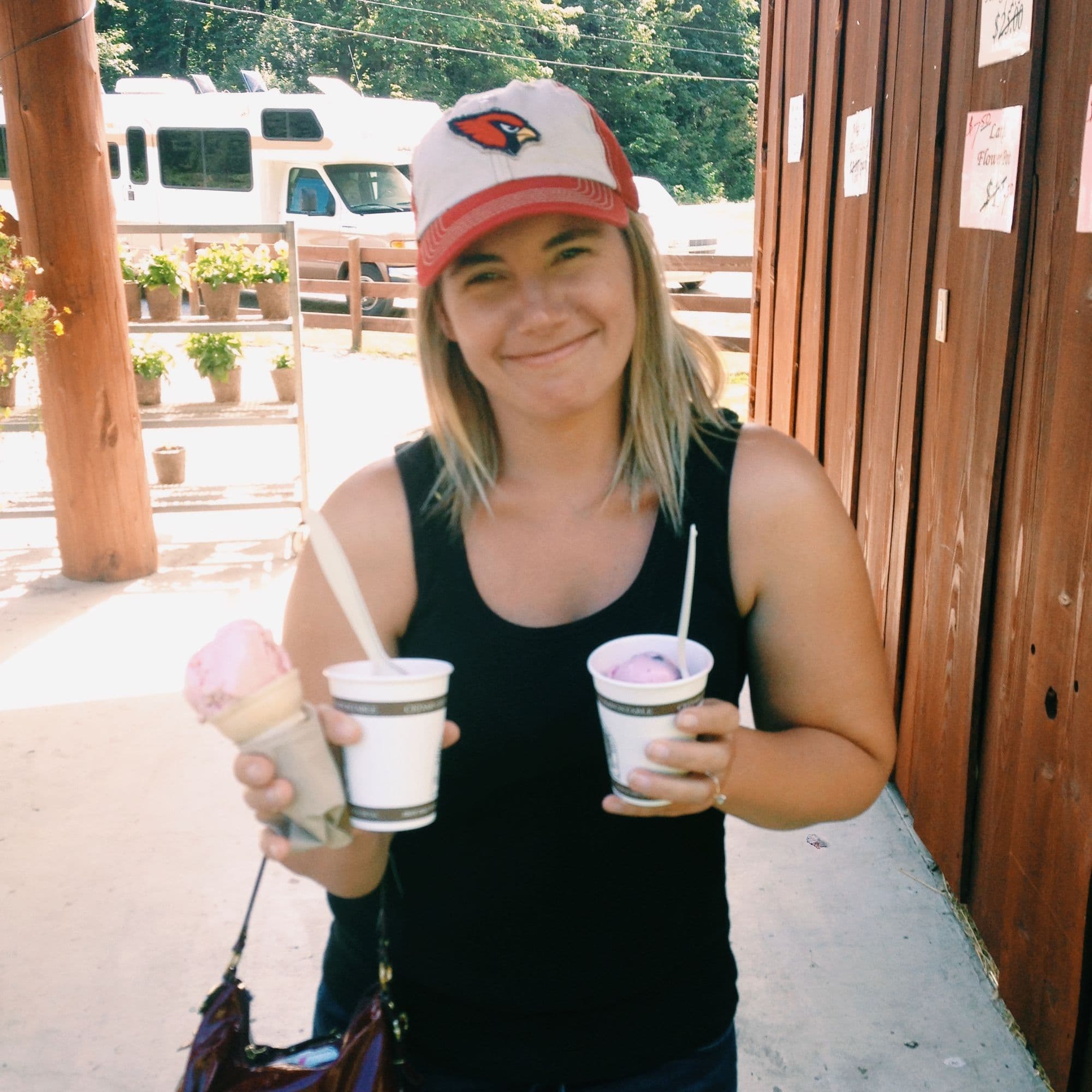 Woman holding ice cream cones