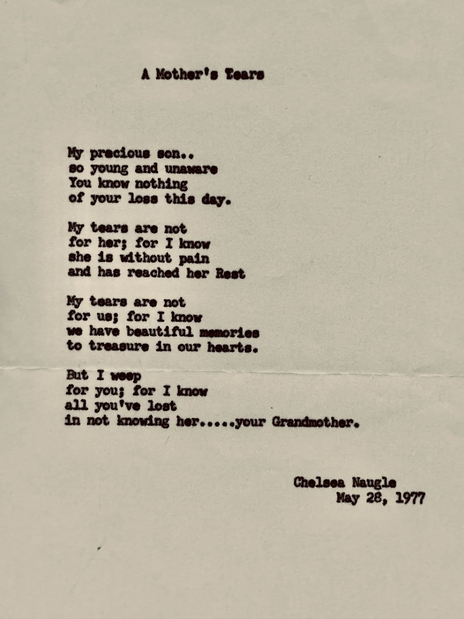 A typed poem titled “A Mother's Tears”, signed Chelsea Naugle and dated May 26, 1977