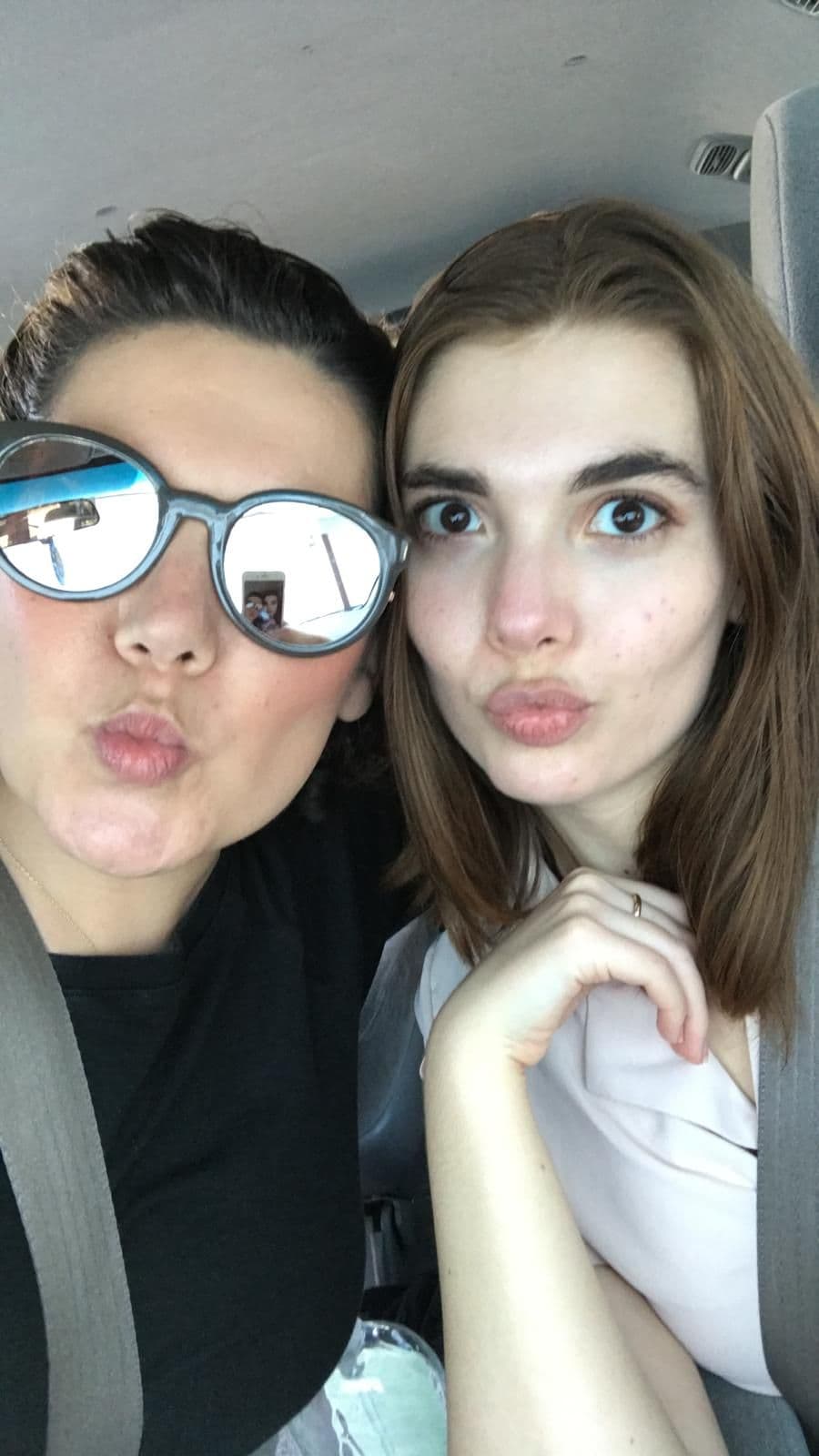 Woman and young woman making faces